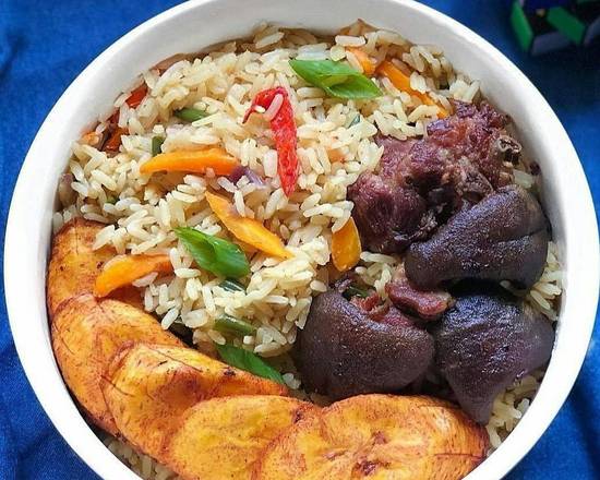 Fried Rice, plantain, and Goatmeat